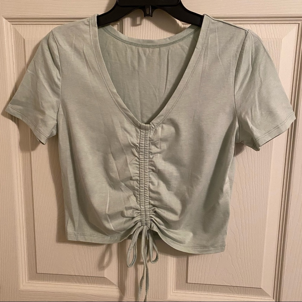 SHEIN pull over crop top with ruched accent center. Size M.  Muted mint green